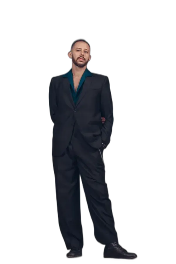 Nicholas Tapia in a dark suit